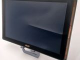 an image of a tablet computer sitting on top of a white table