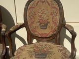 two chairs sitting next to each other on the floor