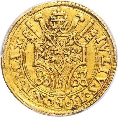 a gold coin with a crown on top of it
