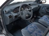 a car that is sitting in a room with its door open