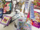 a lot of children ' s toys and books on the table