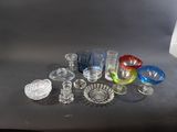 a lot of glass items sitting on a table