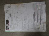 a close up of a piece of paper on the ground