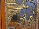 a picture of a picture of an oriental scene in a wood frame