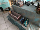 a table that has a bunch of purses on it