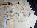 a pile of old letters and envelopes on a table