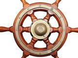 a wooden steering wheel with a brass knob on it