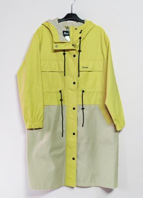 a yellow and grey rain coat hanging on a hanger