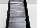 a black box filled with lots of files on a table