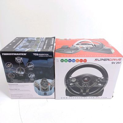 Lot de 2 Volants avec joystick - Non testé - Très bon état -…