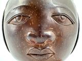 a close up of a statue of a woman ' s face