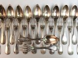 a lot of spoons and spoon spoons on the table