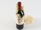 a bottle of wine that is sitting on a table