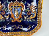 a blue and yellow plate with a picture of angels on it