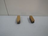 two toy buses that are sitting on a table