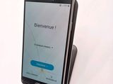 a cell phone that is sitting on a stand