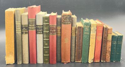 a lot of books that are stacked together on a table
