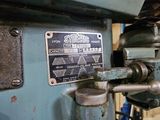 a close up of a machine with a sign on it ' s side