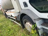 a truck that is parked on the side of the road