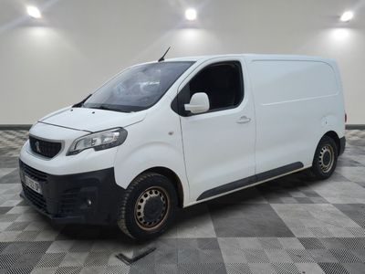 a picture of a white van parked in a room