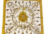 yellow and white square scarf with keys and keys on it