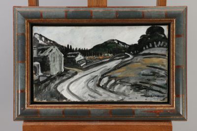 une peinture à l'huile représentant une route de campagne, encadrée et posée sur un chevalet