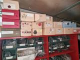 many boxes on the shelves in the room