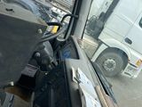 a view of a truck through the window of a truck