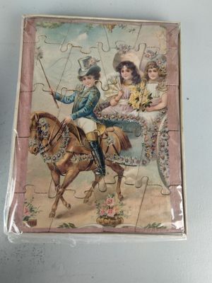 a picture of a puzzle piece with a picture of a couple riding a horse