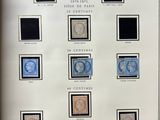 an old framed picture of a collection of stamps on a table