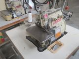 a sewing machine that is sitting on a table