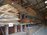 many stacks of wood on the shelves in the warehouse