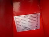 a close up of a label on a red machine that is not working