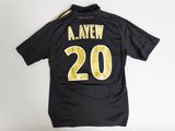 a black jersey with the number 20 on it
