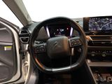 the interior of a car with a steering wheel, dashboard, and dash board