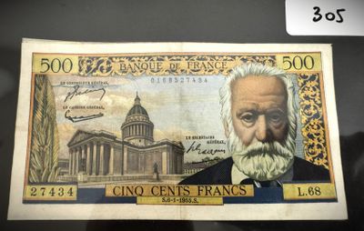 un vieux billet de banque sur lequel figure le portrait d'un homme barbu