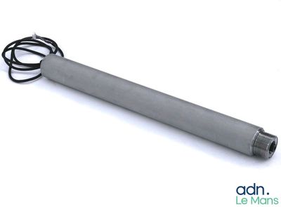 an image of a metal tube with a cord attached to it