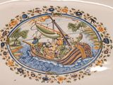 a plate with a picture of a boat on it