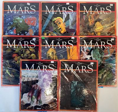 the covers of a series of books are lined up on a table