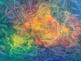 abstract painting of a rainbow colored flower in a field of grass