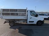 a white truck that is parked in a parking lot