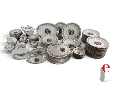 a pile of china plates and bowls on a white surface