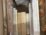 a box full of books that are sitting on a table