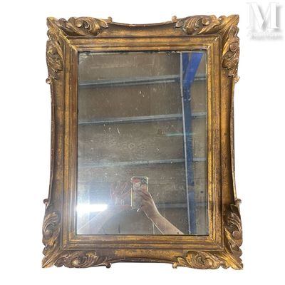 a person taking a picture of themselves in a mirror