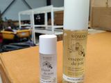 an image of a bottle of lotion and a bottle of lotion sitting on a table