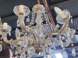 a chandelier hanging from the ceiling in a store