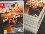 a close up of a bunch of nintendo wii games on a table