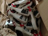 a cardboard box filled with many different types of shoes