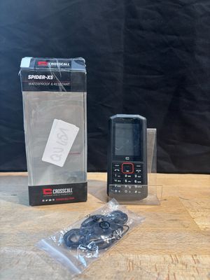 un téléphone portable posé sur une table