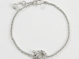 bracelet plaqué argent avec un fermoir en forme de cœur et une breloque en forme de cœur sertie d'un diamant